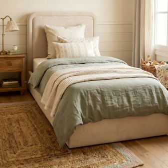 Upholstered bed with storage beige Kay 90x190cm