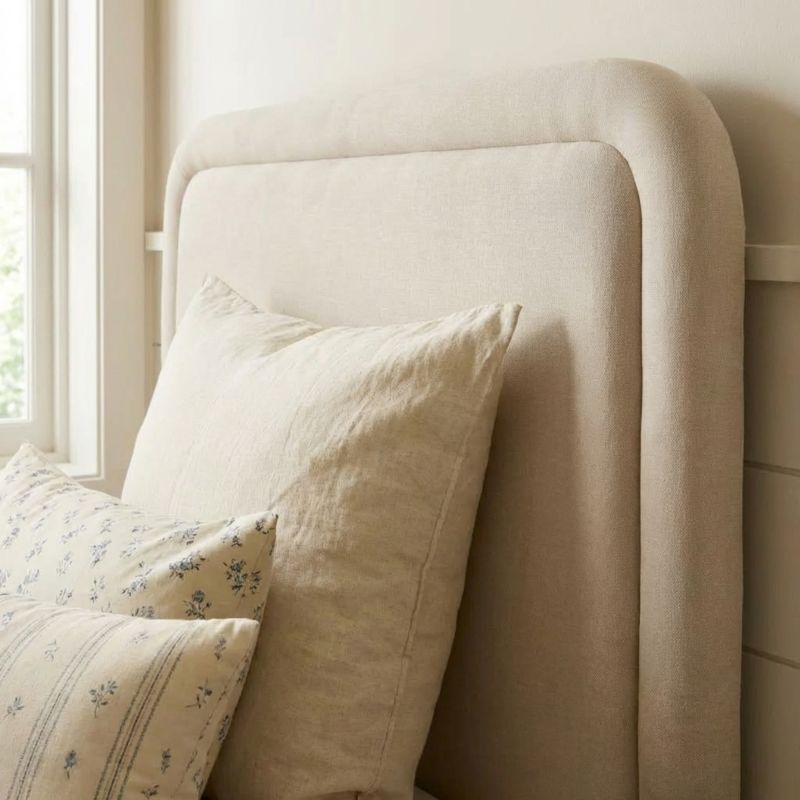 Cama tapizada con almacenamiento beige Kay 90x190cm